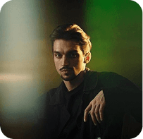 Moody portrait of a man in green cinematic light