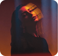 Motion blur female portrait with neon streaks
