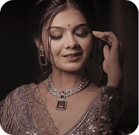 South Asian bride smiling in traditional jewellery
